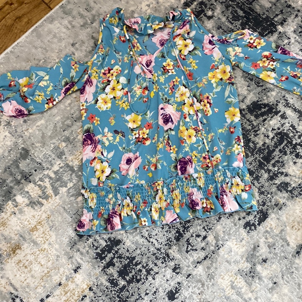 A great cold shoulder blouse for spring and summer.